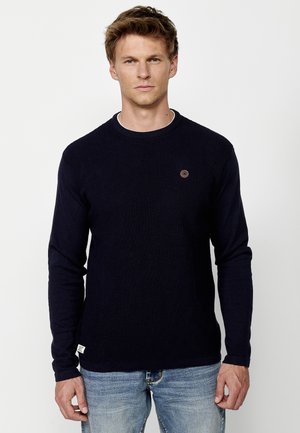 - Sweter