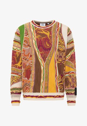Sweatshirt multicolore avec des motifs complexes en rouge, jaune, vert et marron, avec tricot texturé et poignets et ourlet côtelés.