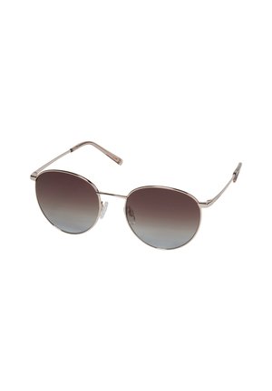 Lunettes de soleil aviateur métalliques avec des verres gris dégradés, forme ovale, fines montures en argent, plaquettes de nez réglables et branches élégantes.