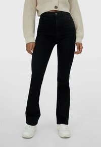 Stradivarius Vaqueros bootcut - black
