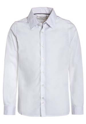 Chemise blanche à manches longues en coton, avec col classique, fermeture à boutons et poignets à boutons. Texture du tissu lisse.