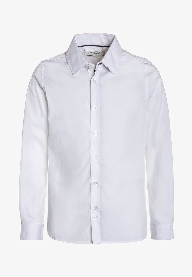 Chemise blanche à manches longues en coton, avec col classique, fermeture à boutons et poignets à boutons. Texture du tissu lisse.