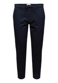 Granatowe bawełniane spodnie z elastycznym pasem, zwężanym krojem i kieszeniami z przodu. Gładka faktura i minimalne detale.