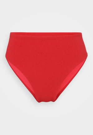Bikini de talle alto rojo con una textura suave. Presenta paneles laterales en contraste y un acabado sin costuras para mayor comodidad y ajuste.