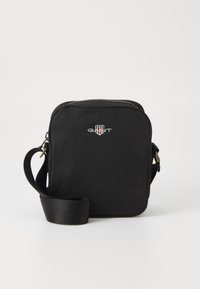 ARCHIVE SHIELD SHOULDER BAG UNISEX - Taška cez plece - black