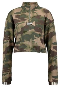 Kamouflage tröja med halv dragkedja, framficka och ribbade manschetter. Tillverkad av mjukt tyg i gröna och bruna nyanser.