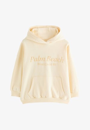 Kremne barvna jopa s kapuco, sprednjim žepom in vezenim napisom "Palm Beach West Coast 95" na prsih.