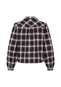 Chemise à manches longues à carreaux en brun foncé, noir et blanc avec poignets boutonnés et un empiècement au dos.