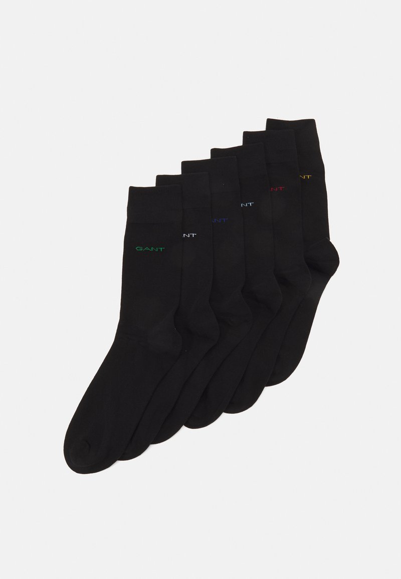Schwarze Baumwollsocken im Set von sechs, mit dem "GANT"-Logo in kontrastierenden Farben: Grün, Rot, Blau und Gelb. Glatte Textur mit Knöchelhöhe.