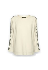 Roomkleurige trui met lange mouwen en donkergrijze ketting-achtige steekdetails langs de buitenkant van de armen.