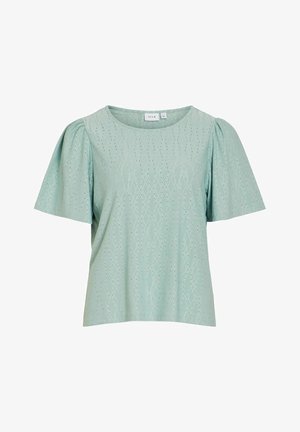 Light green short-sleeve blouse with puffed sleeves and diamond-shaped eyelet embroidery, round neckline, and straight hem.