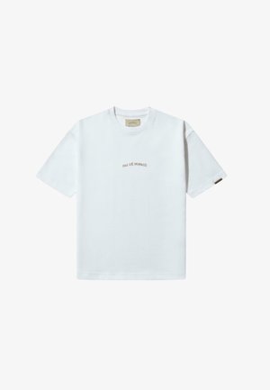 Weißes Baumwoll-T-Shirt mit kurzen Ärmeln und rundem Ausschnitt. Auf der Vorderseite mit dem in Hellbraun gestickten Text "PAS DE MONACO" versehen.