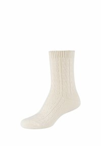 Beige gestrickte Socke mit einem strukturierten Muster. Verfügt über einen gerippten Bund und eine verstärkte Zehenpartie, gefertigt aus weichem Material für hohen Komfort. Steht aufrecht.