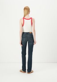 ONLY ONLWAUW MID WAIST - Traperice uskog kroja - dark blue denim