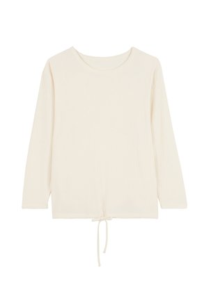 Top léger en ivoire à manches longues avec un col rond et un cordon de serrage à l'ourlet. Le tissu présente une texture côtelée.