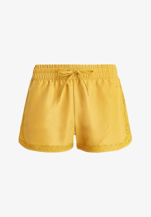 Žlté športové šortky s elastickým pásom, šnúrkou a čipkovým lemom na spodnej strane. Vyrobené z hladkého, ľahkého materiálu.