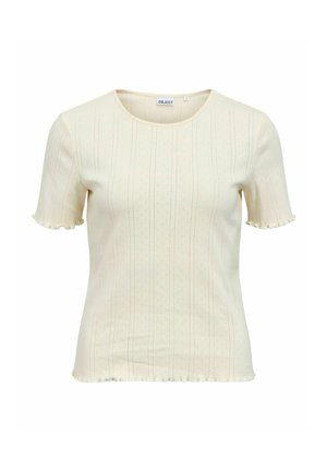 Kermansävyinen, lyhythihainen ribbineulottu paita, jossa hillityt pystykoristeet, pyöreä pääntie ja röyhelöidyt reunat hihoissa ja helmassa.