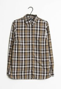 Langærmet ternet skjorte i brune, hvide og sorte farver. Har en klassisk krave, knaplukning foran og en let buet kant.