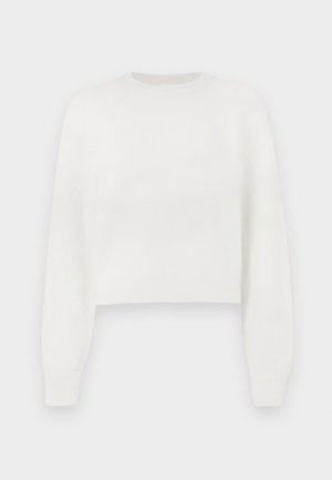 Vit kortärmad tröja med lång ärm, gjord av mjukt material. Har rund hals och ribbade muddar. Slät textur, minimalistisk design.
