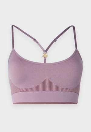 Lilla bralette med justerbare stropper, ribbestruktur nederst og en glatt overflate. Har gyldne detaljer.