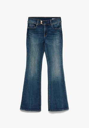 Tumed sinise tooniga laienevad teksapüksid, millel on hele pesuvärvuse efekt. Omavad tavalist viie taskuga disaini, nööp-kinnitust ja õmblusdetailidega aktsente.