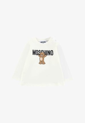 Biała koszula z długim rękawem z grafiką brązowego niedźwiedzia i tekstem "MOSCHINO" w czerni. Wykonana z miękkiej bawełny, z zatrzaskami na ramieniu.