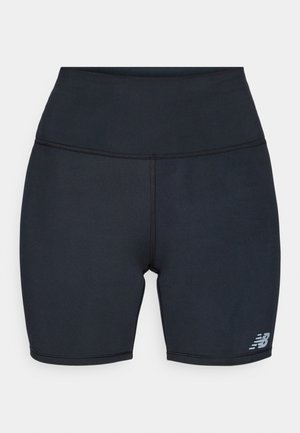 Calções atléticos pretos feitos de um tecido elástico e que afasta a humidade. Possui uma cintura alta e um logo refletor na coxa.