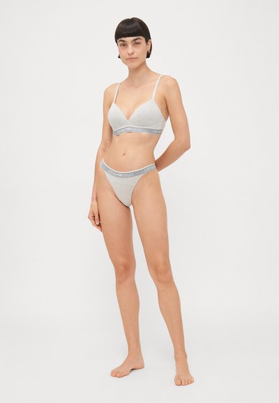 Gray lingerie set featuring a bralette with thin straps and a V-neck design, paired with matching thong, both adorned with logoed elastic bands.