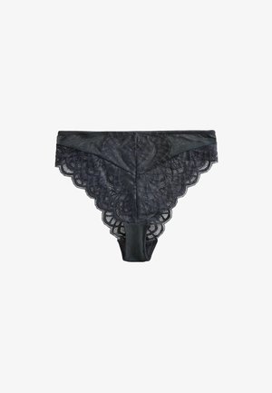 Sort blonde trusse med bølgede kanter, der har et glat frontpanel og intrikat blomsterbroderi på bagsiden.