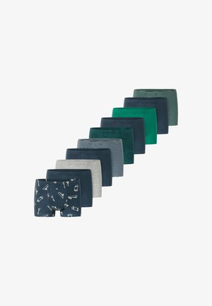 Ni par drengeboxershorts i forskellige farver og mønstre, herunder marineblå, grøn, grå, striber, smilende ansigter og skateboards.