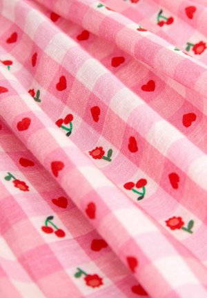 Pink checkered fabric featuring a pattern of red hearts, flowers, and cherries, with a soft texture and lightweight design.