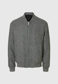 Hallide herringbone bomber-jakk, millel on ees lukuga viisard ja ribitud krae, varrukad ning hems. Omab sileda ja tekstuuriga kangast.