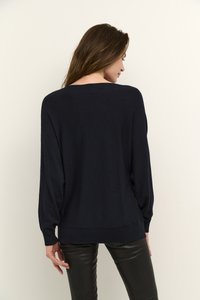 Navy blue knitted sweater with a loose fit, wide neckline, and long sleeves. Ribbed cuffs and hem. Smooth texture with minimal detailing.