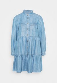 Denim dress with long sleeves, button-down front, two chest pockets, tiered skirt, and light blue color. Soft texture, casual design.