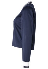 Camicione a maniche lunghe blu navy con righe verticali, colletto bianco a fantasia e polsini a costine con righe blu e bianche. Materiale misto cotone.