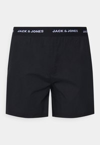 Boxers negros con cinturilla elástica y la inscripción "JACK & JONES" en blanco. Confeccionados en una tela suave, diseño simple.