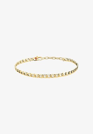 Collana con catena in oro con un mix di maglie spesse e sottili e una chiusura con un piccolo dettaglio rosso su sfondo bianco.