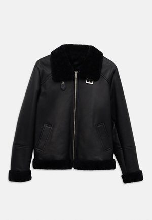 Black leather jacket with a shearling collar, front zipper, and two side pockets. Cuffs and hem are also trimmed with shearling.