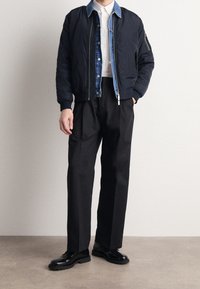 Calvin Klein Kalhoty - black