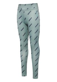 Ljust gröna leggings av tyg med tryck av en navy logotyp över hela. Designen har en tight passform och en slät yta. Ingen synlig hårdvara.