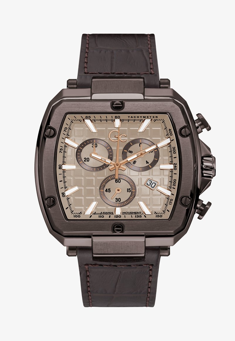 Brun läderremmsur med ett fyrkantigt bronsfärgat boett, strukturerad beige urtavla, tre subdials och ett datumfönster vid klockan 6.