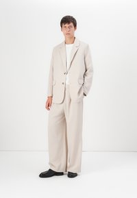 YOURTURN UNISEX - Pantalon classique - stone