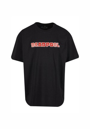 T-shirt en coton noir avec le mot "DEADPOOL" en lettres rouges grasses sur la poitrine, avec un col rond et des manches courtes.