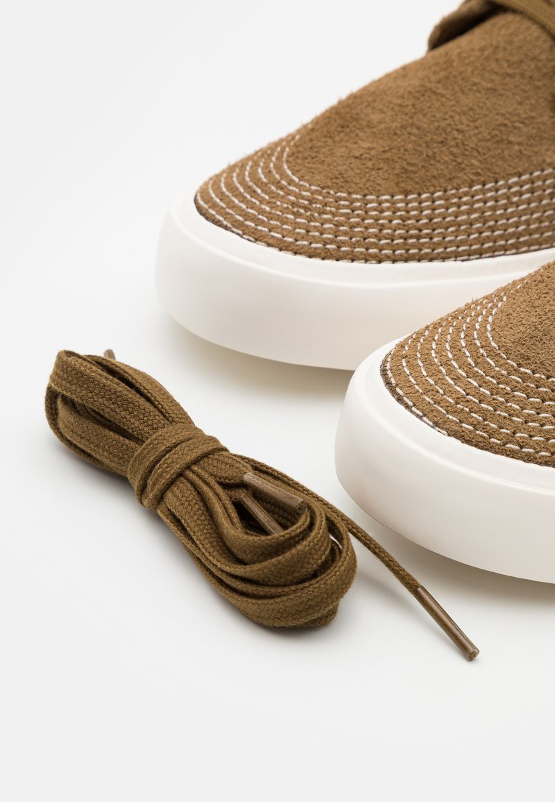 Nike Sb Zoom Janoski Unisex Trainers Yukon Brown Sail Mystic Navy Olive Zalando De