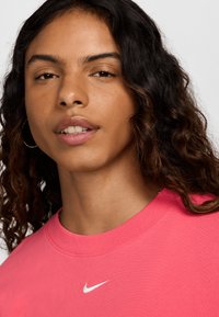 Nike Sportswear ESSNTL - Trikotāžas kleita - aster pink