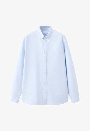 Chemise à manches longues bleu clair en coton. Elle présente un col avec boutons et une coupe droite avec fermetures à boutons. Texture unie.