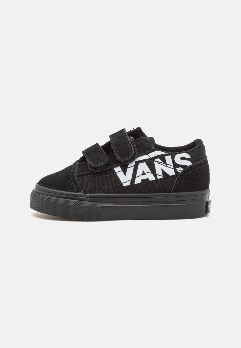 Baskets Vans bébé noires avec deux bandes velcro, logo Vans blanc sur le côté, semelle en caoutchouc et bout texturé.