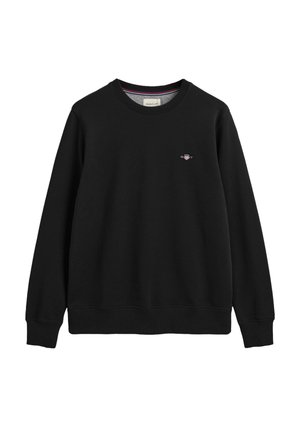 Black sweatshirt made of soft fabric, features a round neck, ribbed cuffs and hem, with a small embroidered logo on the chest.