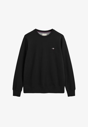 Schwarzer Pullover aus weichem Stoff, mit Rundhalsausschnitt, gerippten Bündchen und Saum sowie einem kleinen bestickten Logo auf der Brust.