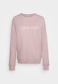 Lichtroze sweatshirt gemaakt van een katoenmix, met een ronde halslijn, lange mouwen en een wit "Calvin Klein" logo op de voorkant.